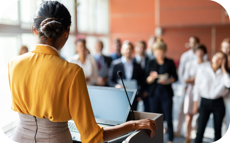Woman at Podium 2